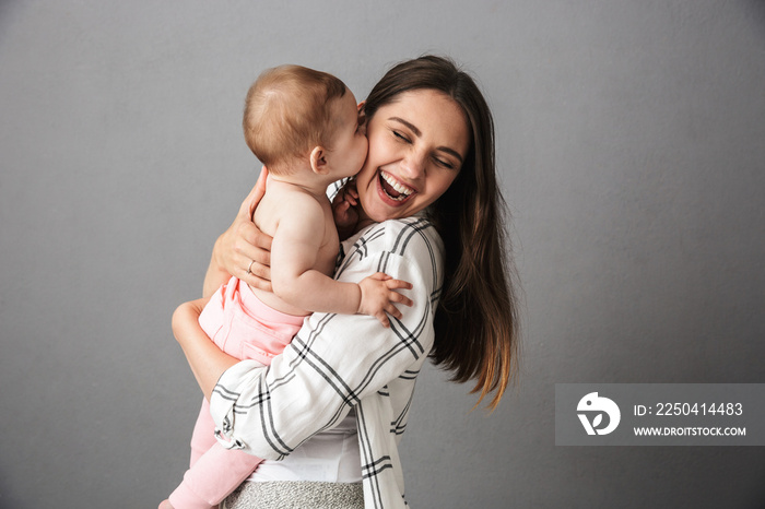 Portrait of a joyful young mother