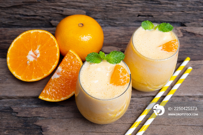 Orange fruit juice smoothie yellow juice drink healthy delicious taste in a glass for weight loss on