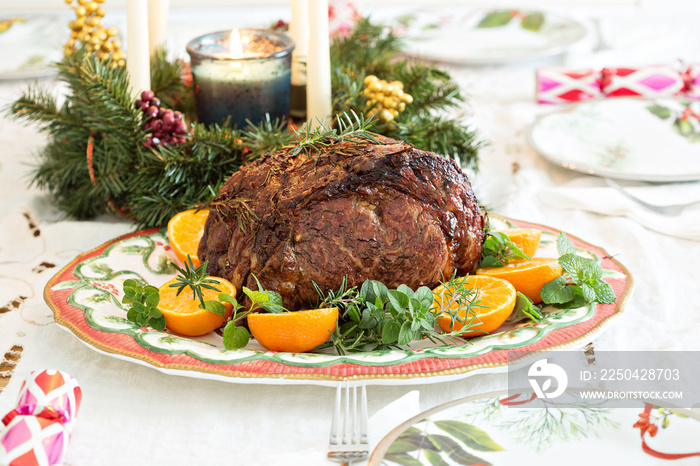 Holiday Christmas prime rib beef roast on the table