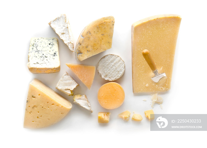 Different kinds of delicious cheese on white background