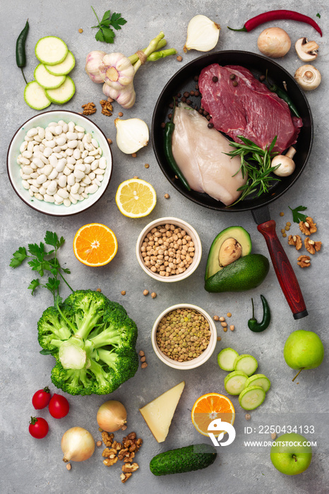 Healthy food background top view different diet food on a light table