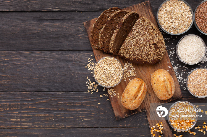 Various Gluten free bread and and grains on wood