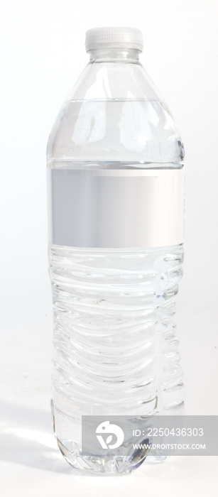 Plastic water bottle on white background with blank label.