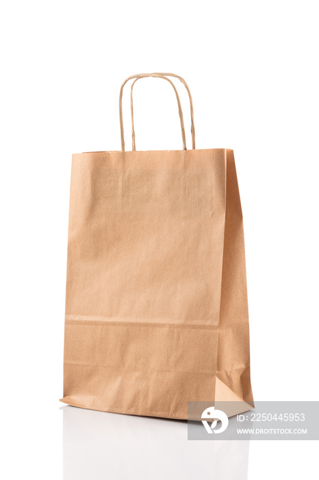 Paper shopping bag on white