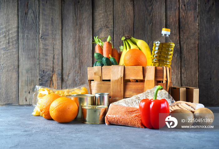 Food donation box with food assortment on the table