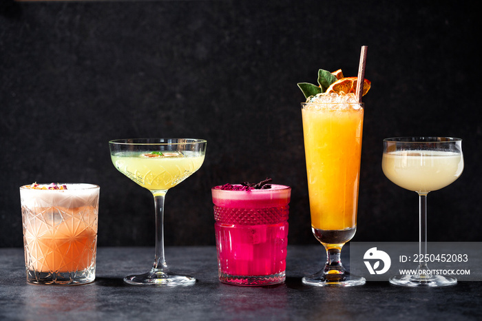 Delightful variously colored refreshment cocktail drinks