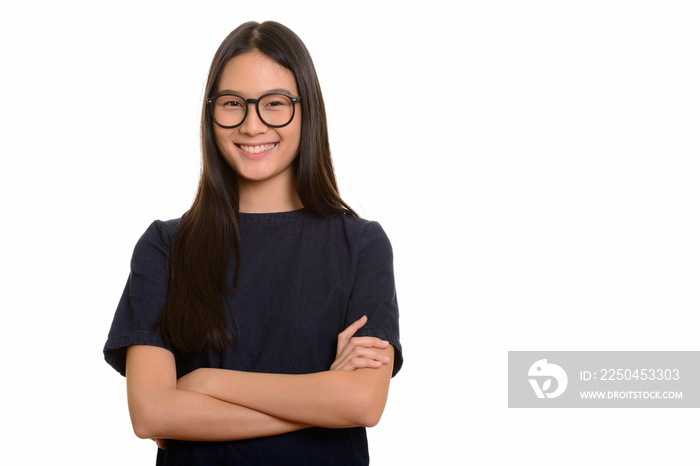 Portrait of young happy Asian teenage girl smiling