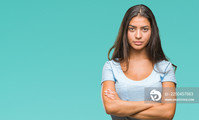 Young beautiful arab woman over isolated background skeptic and nervous, disapproving expression on 