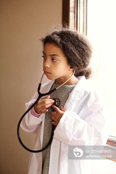 Girl in playing doctors