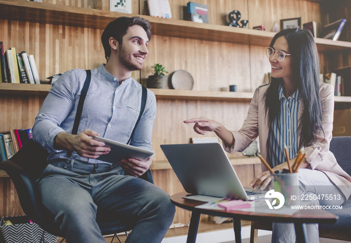 Couple working in modern office