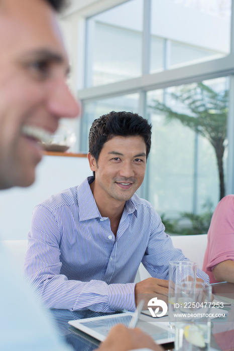 Portrait smiling businessman in meeting