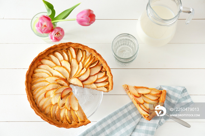 Composition with tasty apple pie on table