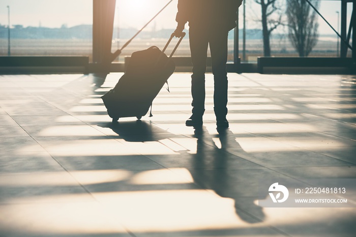 Shadow of the traveler at the airport