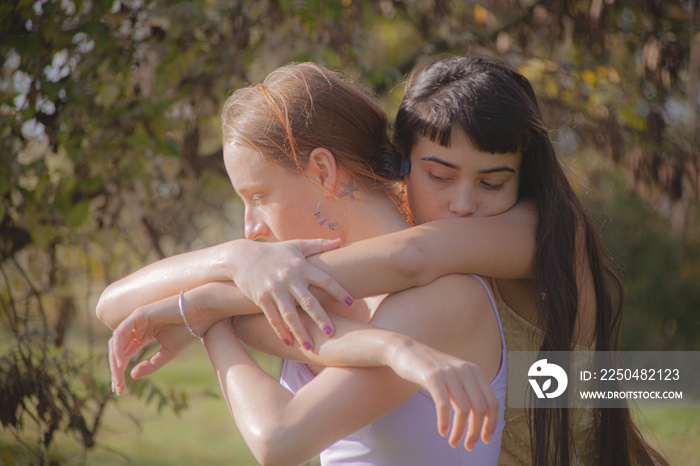 women in nature dancing