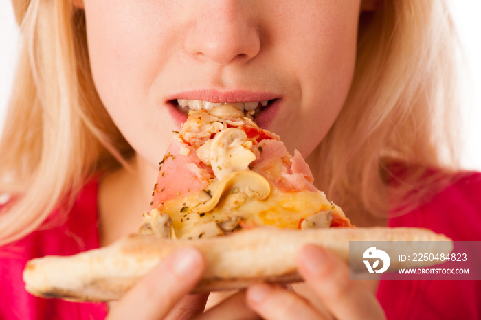 Woman with slice of delicious pizza, cant wait to bite in it.