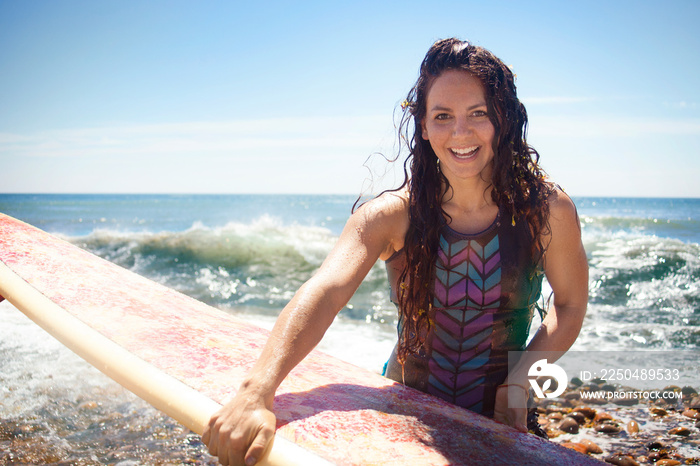 Portrait of mid-adult surfer