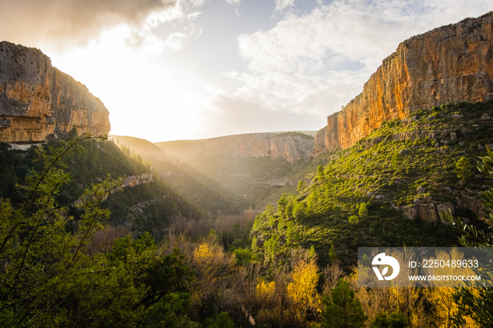 Sunny valley of Chulilla, setting sun over the valley of river Turia, Valencia, Spain.