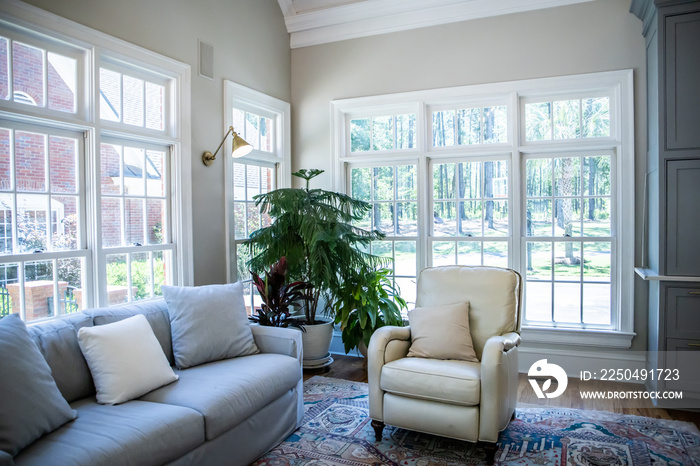 Open Concept Living Room Den with Vaulted Ceilings and Lots of Windows with a Neutral color palette