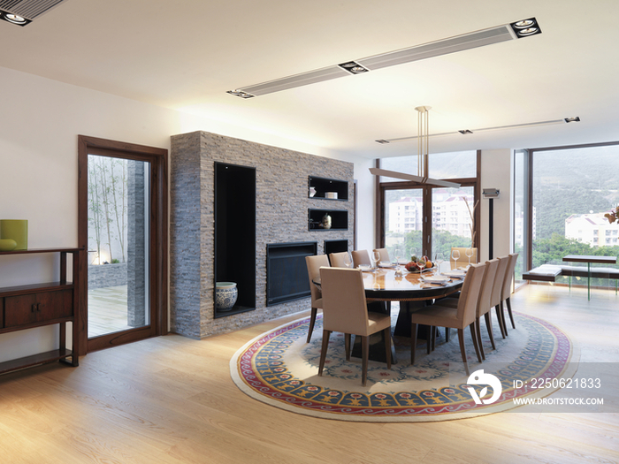 Chairs around set table in a spacious and contemporary dining room with city view; Scottsdale; USA