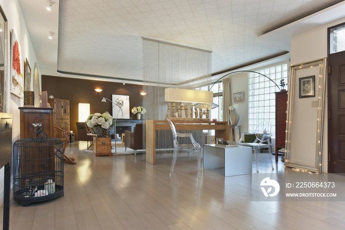 Chess game in sitting area with living room in the background at spacious home