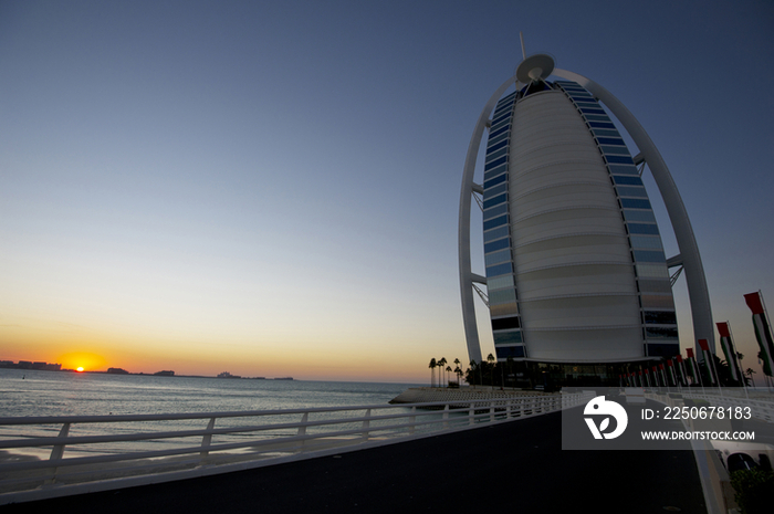 High rise building in Dubai and sunset