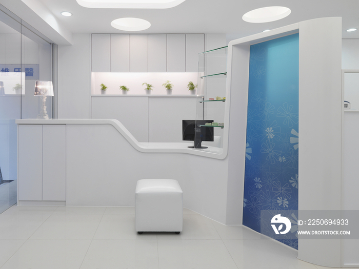 Modern white reception area of dental hospital