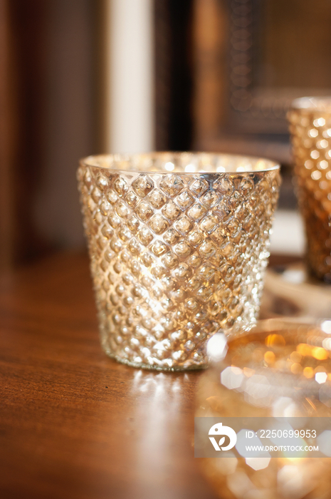 Close-up of candle holders on table against blurred background at home; Scottsdale; USA