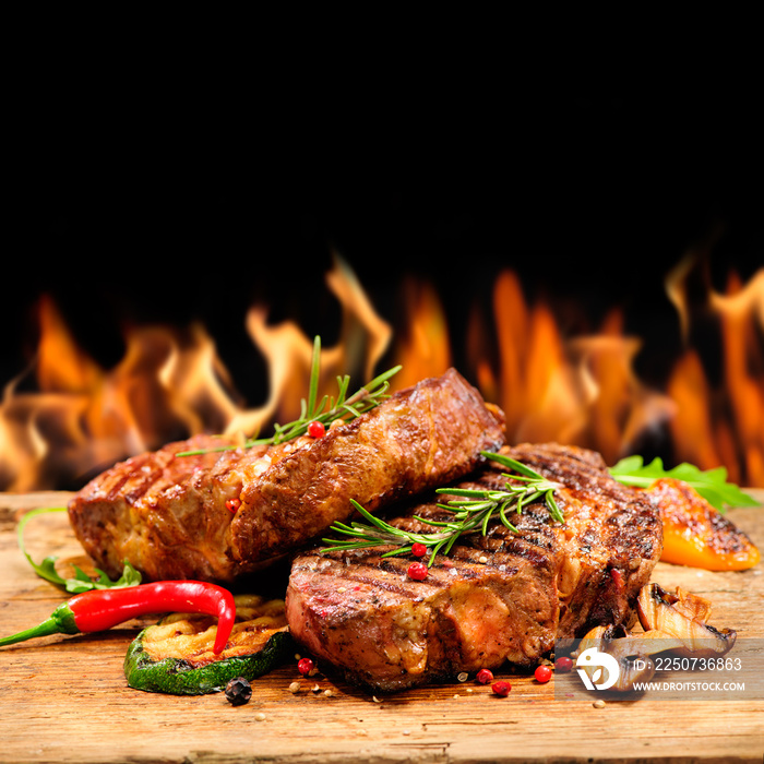 Grilled beef steak with flames