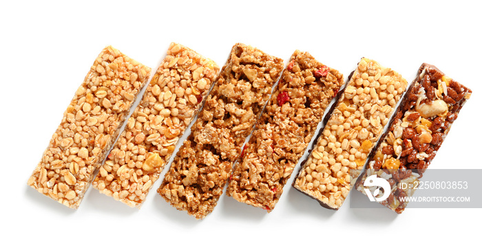 Tasty granola bars on white background