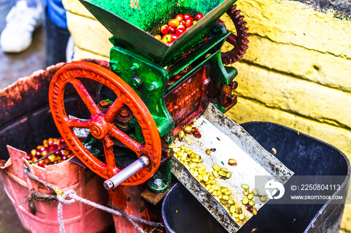 View on traditional coffee grinder machine on Colombian farm