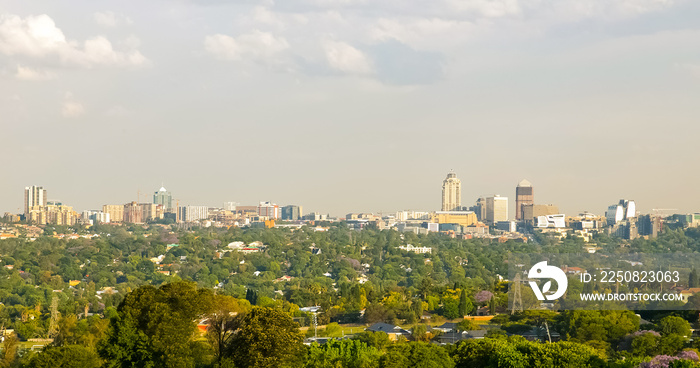 Skyline of buildings and residential suburban neighborhood in Sandton CBD Johannesburg