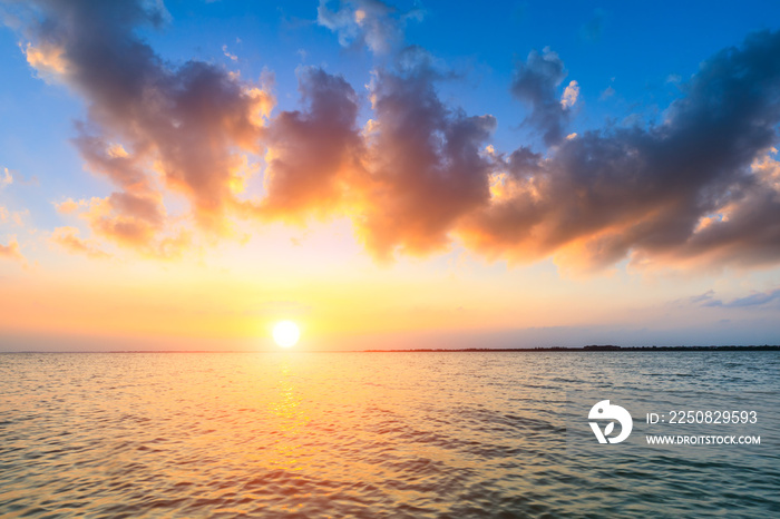 Dreamy sunset landscape by the lake