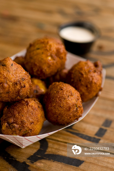 Hush puppies. Deep fried cornmeal made with onions, garlic and butter. Classic Cajun cuisine appetiz