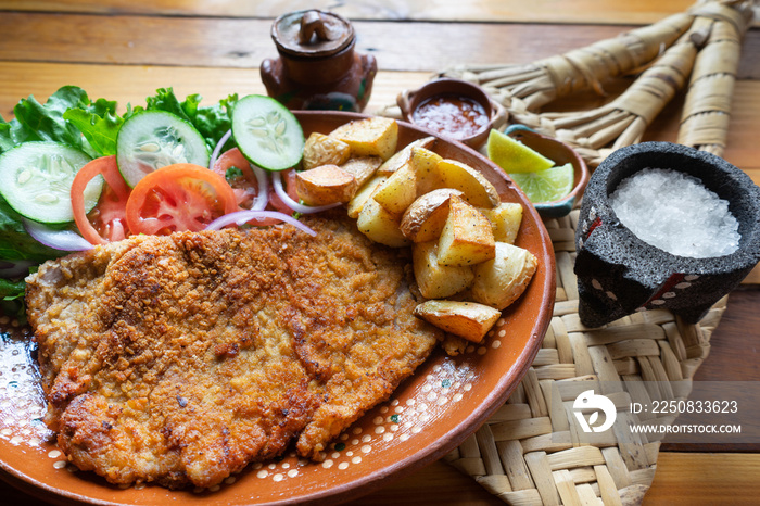 Traditional milanese beef and french fries