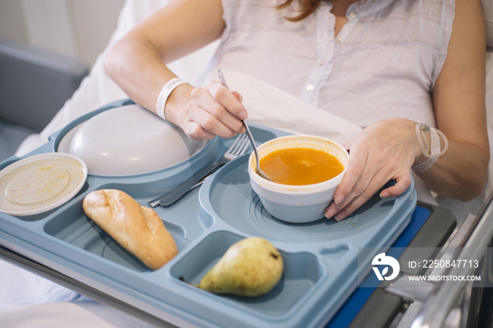 woman eating in the hospital