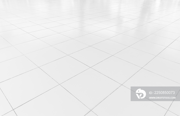 透视图中的白色瓷砖地板背景。干净、有光泽，具有网格线纹理的对称性。用于