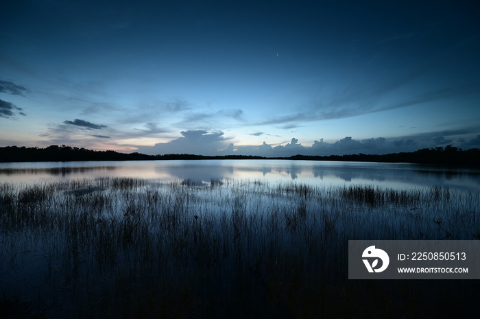Morning twilight over Nine Mile Pond in Everglades National Park, Florida on perfectly calm summer m