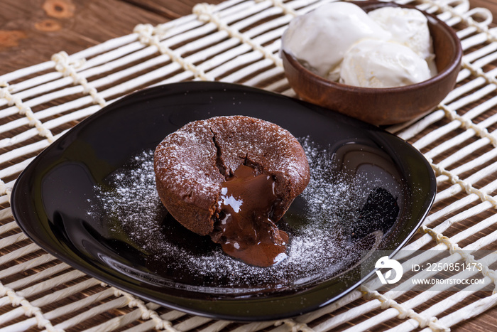 Mouth watering delicious chocolate fondant cake, restaurant serving.