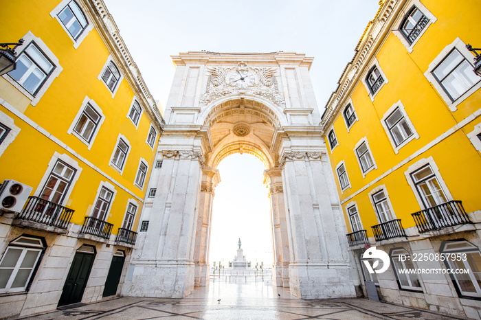 View on the Triumphal arch on the Commerce square during the sunrise in Lisbon city, Portugal