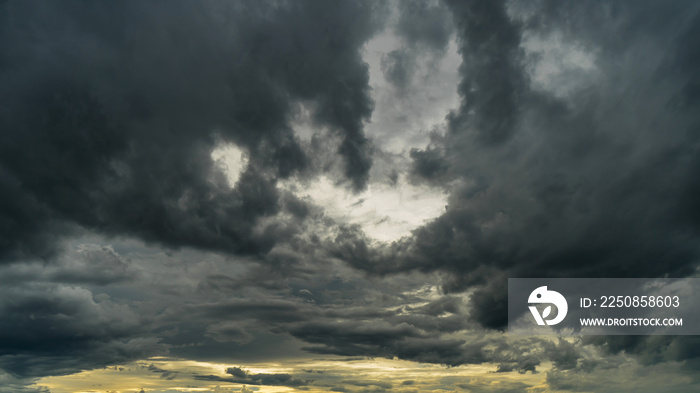 Dramatic storm clouds at dark sky