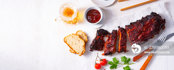 BBQ spare ribs from a charcoal grill