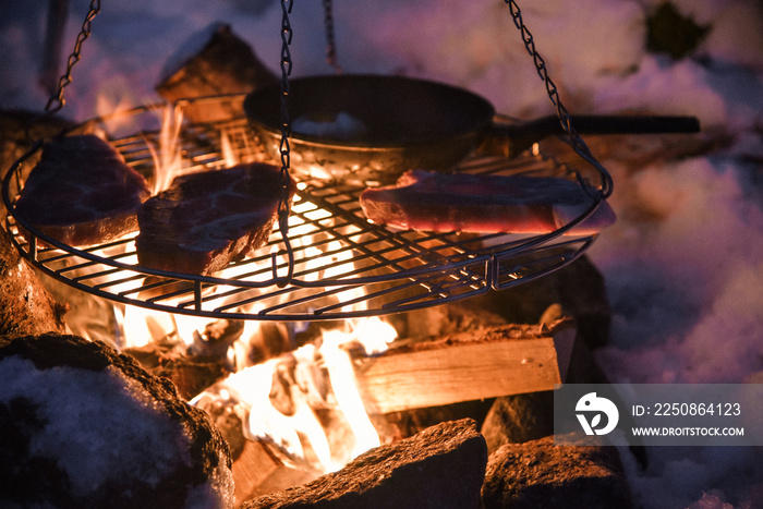Campfire Cooking While Winter Camping Near Kalle on Lofoten Archipelago in the Arctic Circle in Norw