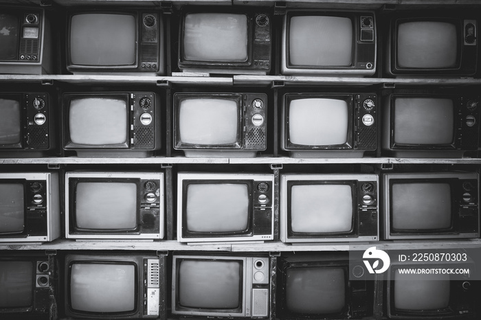 堆黑白复古电视（电视）的图案墙-复古滤镜效果风格。