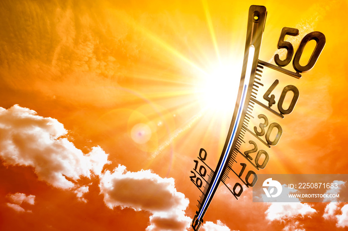 Hot summer or heat wave background, glowing sun on orange sky with thermometer