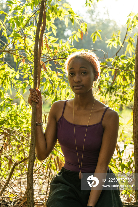 portrait of a young woman in the forest