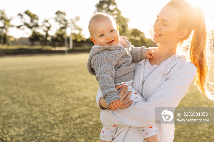 mom and little child spend time together. The concept of spring family vacation. Mothers Day