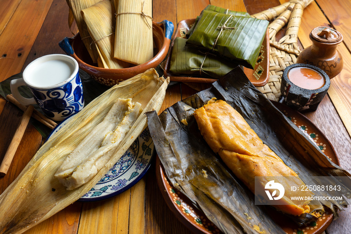 Mexican tamal in banana and corn leaf