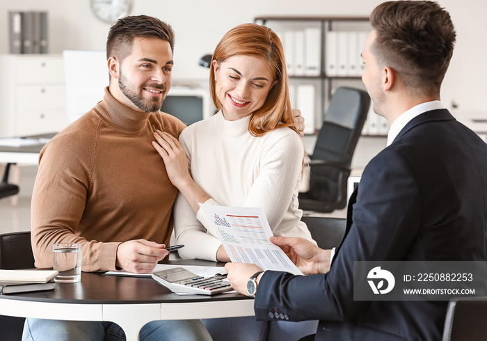 Bank manager working with clients in office