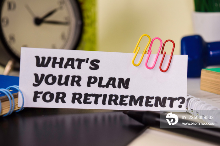 Whats Your Plan For Retirement? on the paper isolated on it desk. Business and inspiration concept