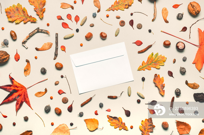 Blank post mail envelope mock up with autumn arrangement